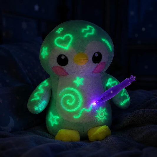 Veilleuse peluche pingouin phosphorescente a dessiner, dessins verts lumineux et stylo