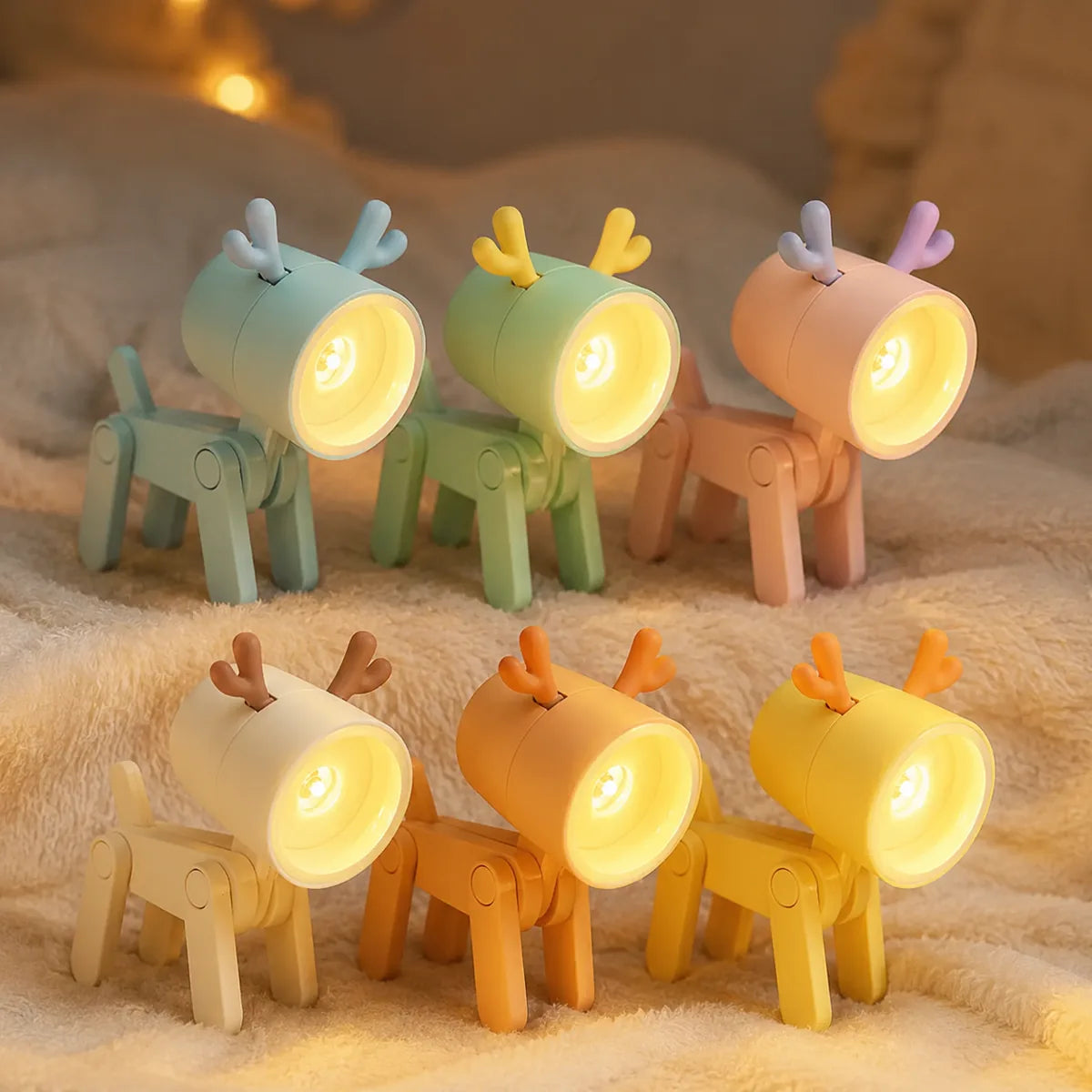 Mini veilleuse cerf declinee en 6 coloris : bleu, vert, rose, creme, orange, jaune, allumees ambiance cosy