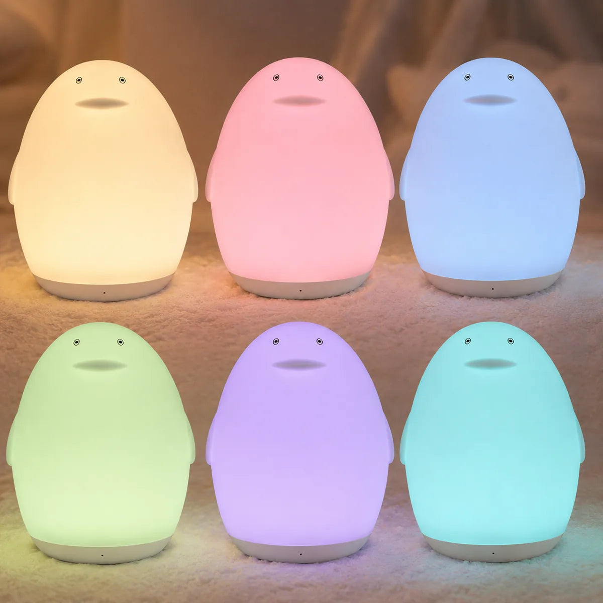 Veilleuse pingouin déclinée dans ses couleurs RGB
